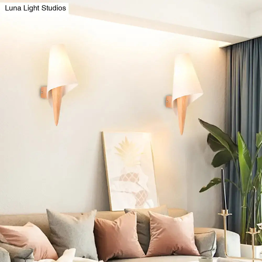 Pair of minimalist wood and white fabric wall-mounted light fixtures with conical shades for bedroom use