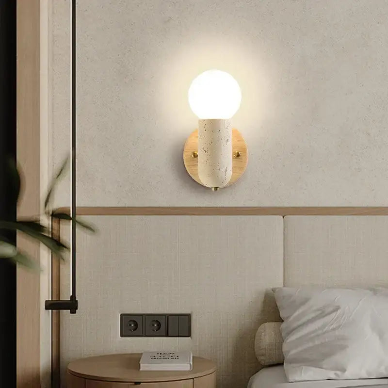 Minimalist wood and yellow travertine led wall sconce with frosted glass globe and ceramic stem for bedroom decorbites led wall lighting