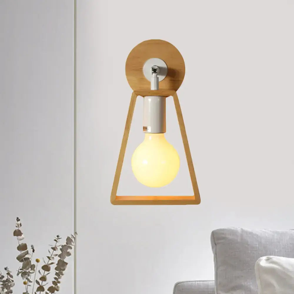 Minimalist warm-toned wall lamp with natural wood trapezoid frame and circular backplate for bedroom sconce