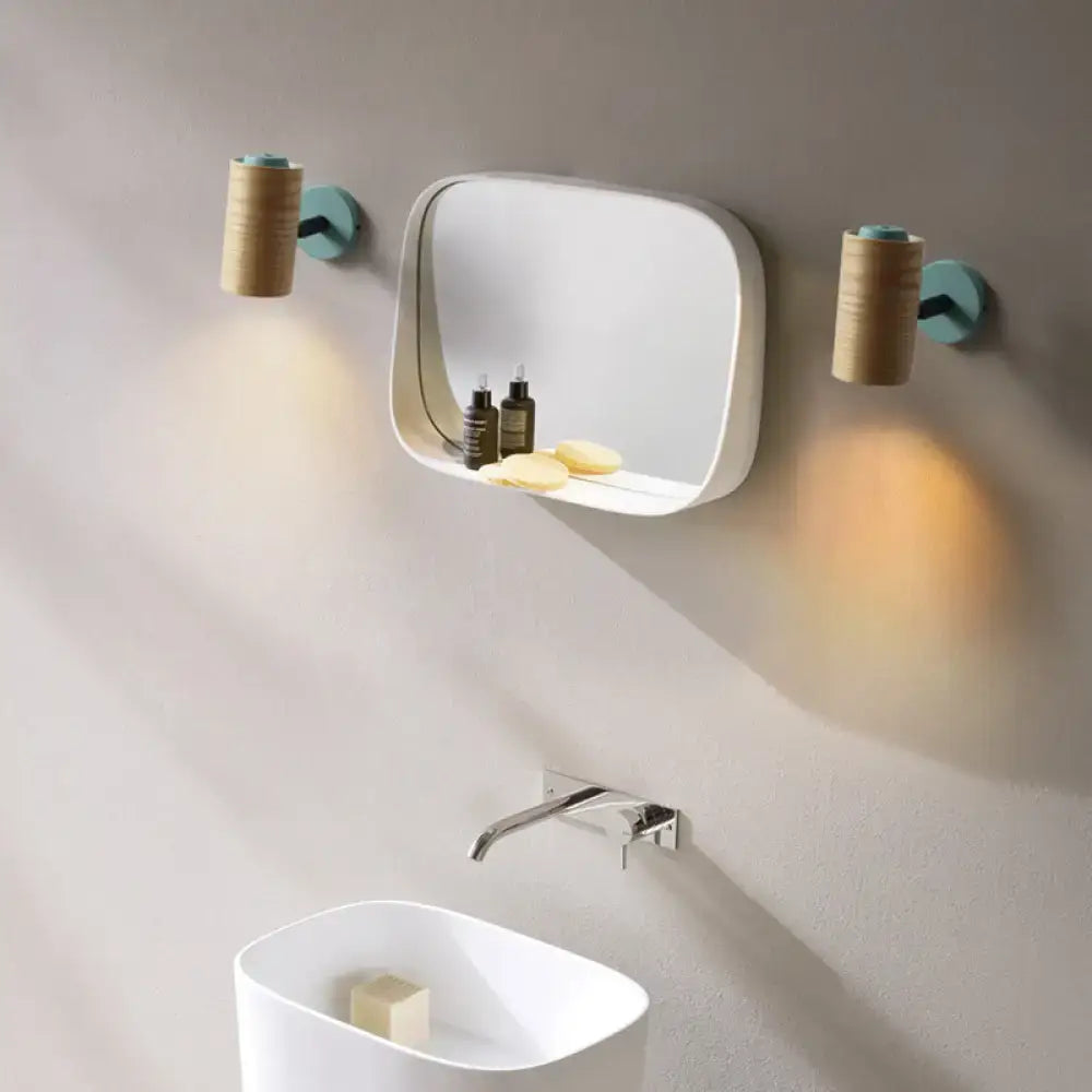 White rectangular minimalist wood wall light fixture with integrated shelf for bathroom use