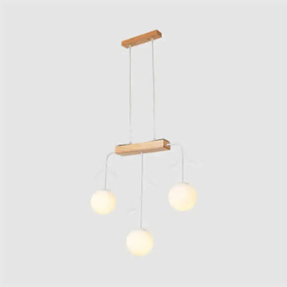 Minimalist wooden hanging lamp decorbites nordic bubble shade island with two wooden bars and three frosted globe bulbs