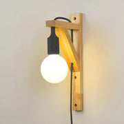 Minimalist wooden wall sconce with a black cord and exposed bulb medium base wall lamp for bedroom use