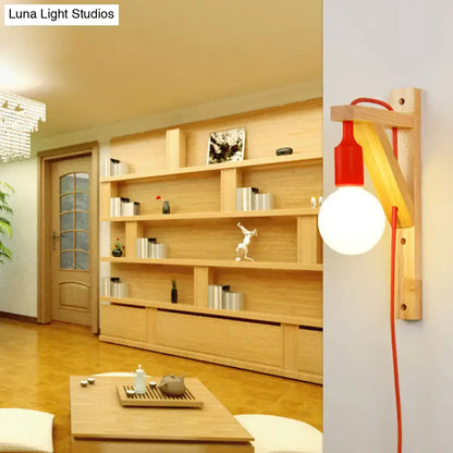 Minimalist red and natural wood wall sconce with spherical bulb and medium base e26 e27 for bedroom lighting