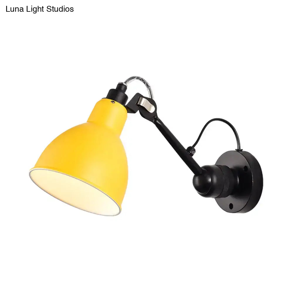 Bright yellow metal wall mounted lamp with black articulated arm for living room wall lamp lighting