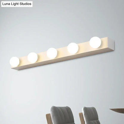 Minimalistic white wooden vanity lighting fixture with five open bulb lights for bathroom vanity lighting