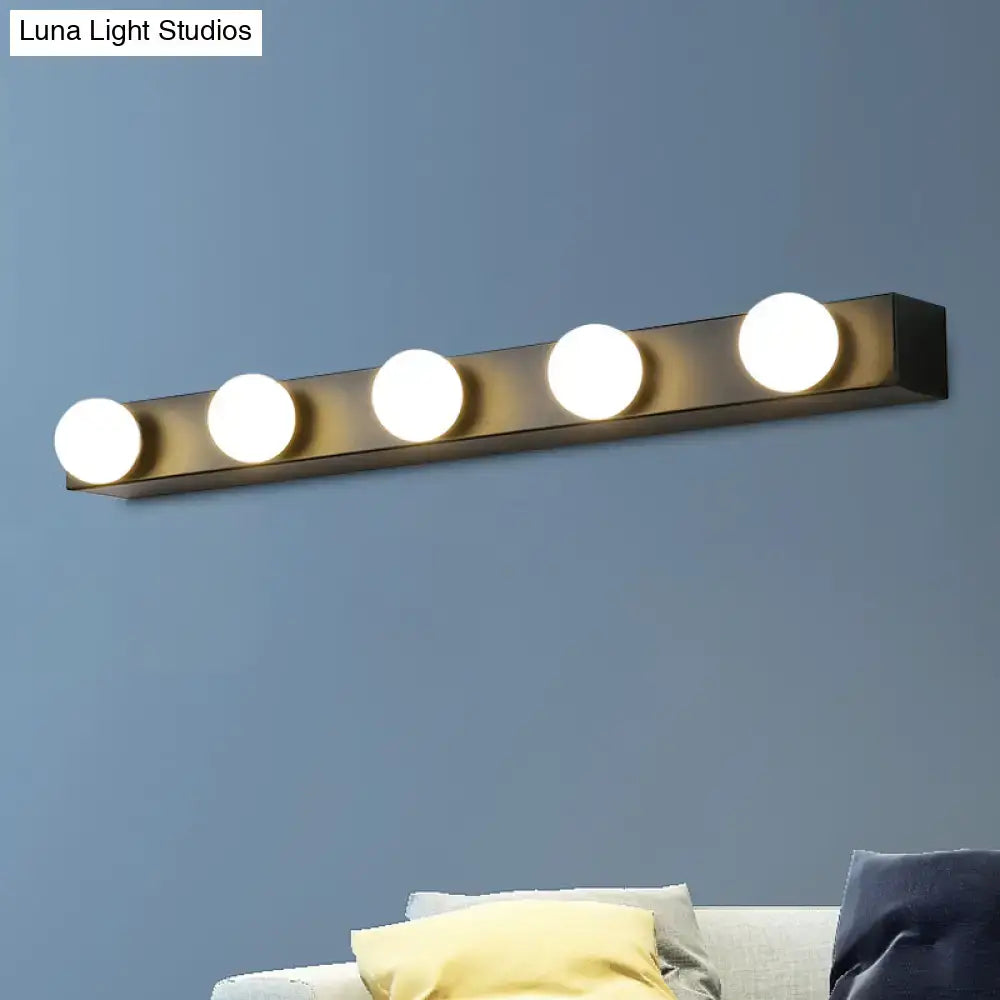 Modern matte black wall-mounted vanity lighting fixture with four open bulb lights for bathroom use