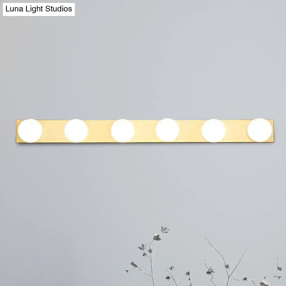 Gold-finished rectangular wall-mounted vanity lighting fixture with five open bulb circular lights for bathroom use