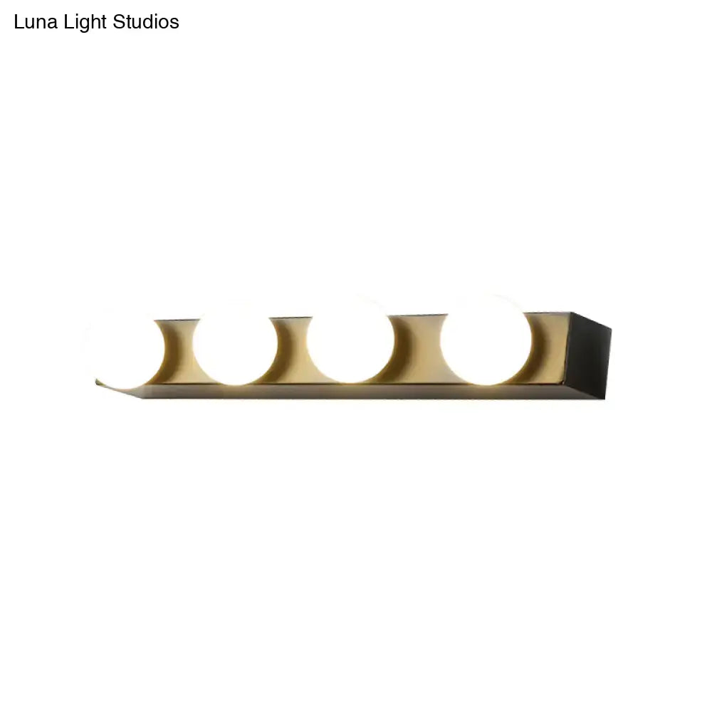 Modern gold-toned wall-mounted vanity lighting fixture with four circular open bulb sections for bathroom use