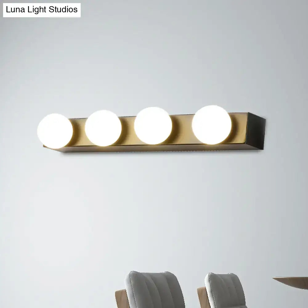 Modern gold-finished wall-mounted vanity lighting fixture with four open bulb spherical lights for bathroom use