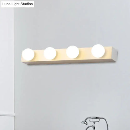 Minimalistic white 4 light vanity lighting fixture with open bulb design and bright round bulbs for bathroom vanity lighting