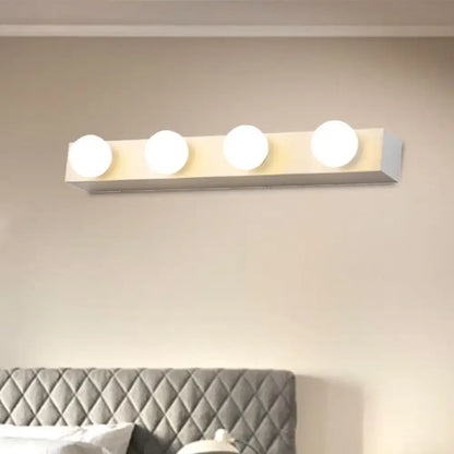 Minimalistic white vanity lighting fixture with four round open bulb lights for bathroom use