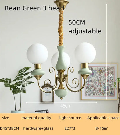 Bean green 3-head chandelier with brass accents and frosted glass globes in mint and gold cream style led decorbites cream style