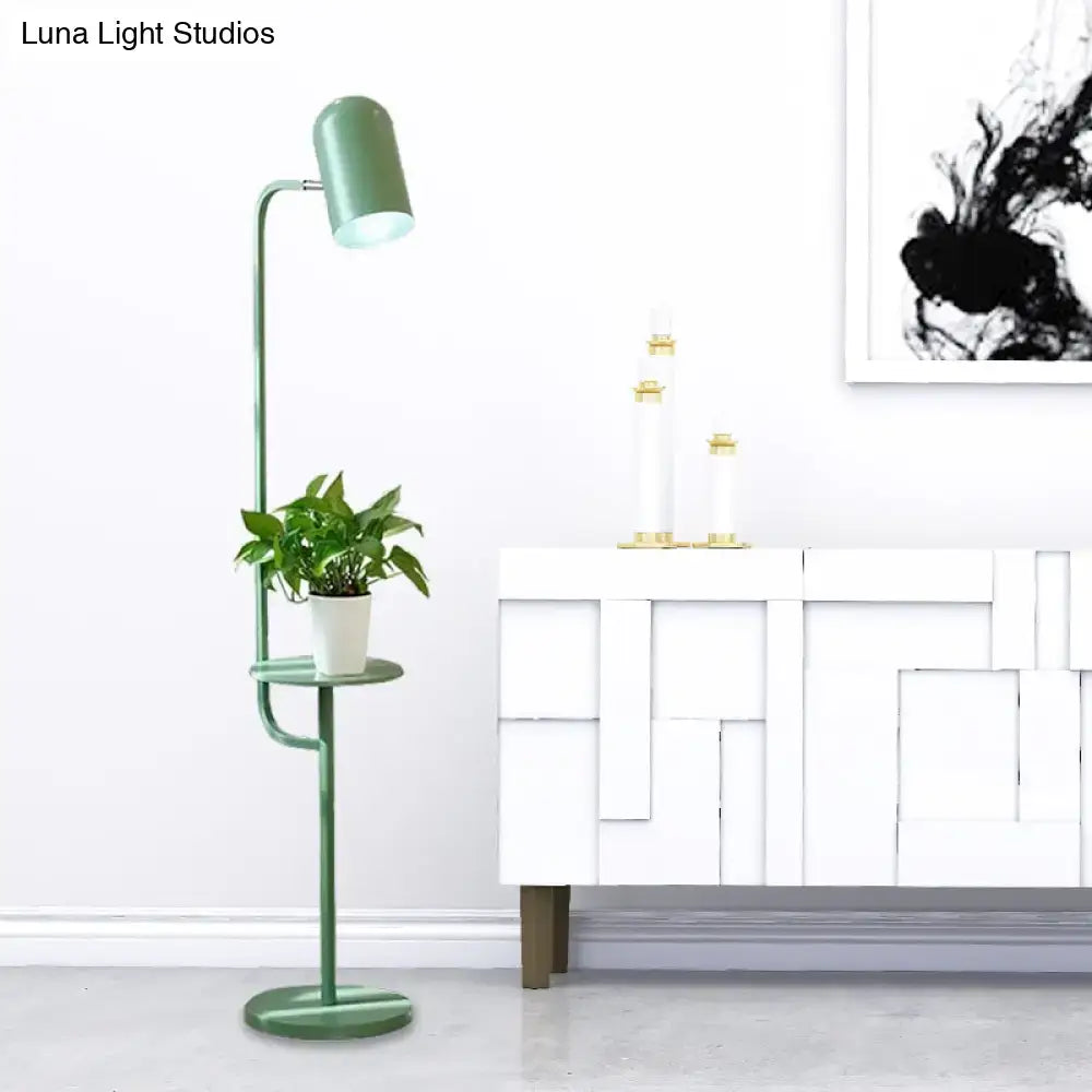 A sleek sage green metal floor light with curved frame and adjustable head for living room reading 220v-240v 110v-120v pink yellow green