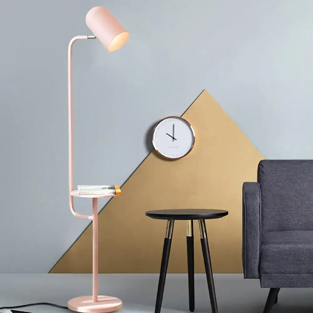 Decorbites metal floor light with pink metallic finish, cylindrical shade, and integrated circular side table for living room use