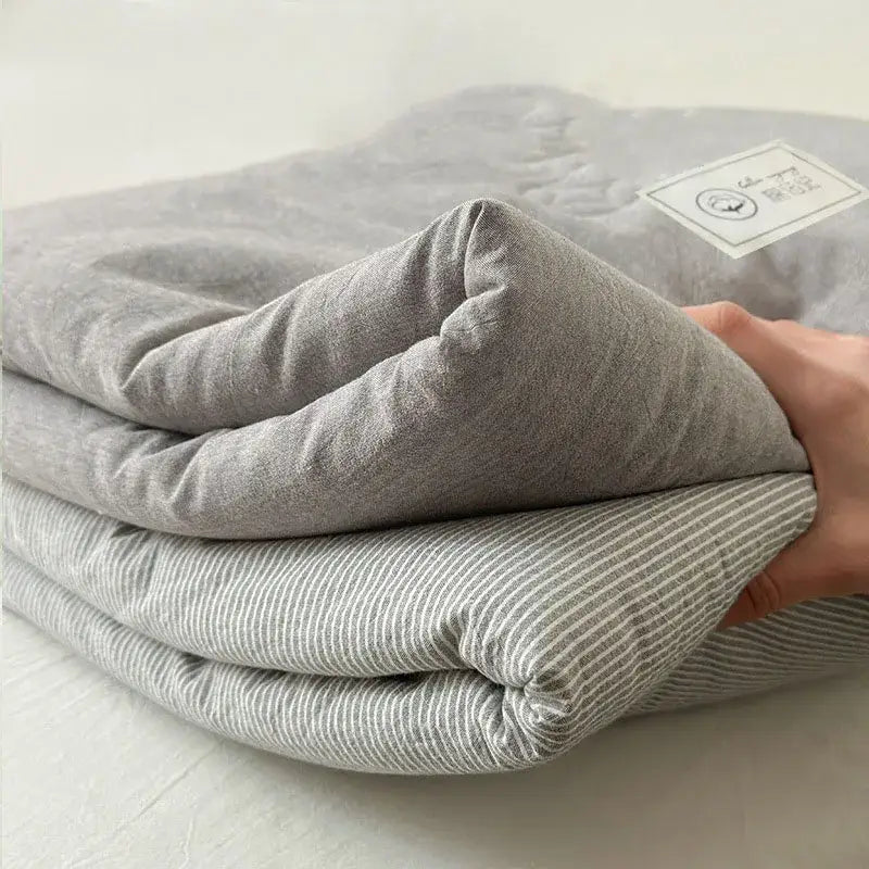 Gray textured cotton summer cooling blanket underside with subtle vertical stripes for decorbites cotton summer use