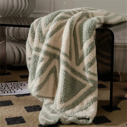 A cream and sage green plush knitted jacquard blanket with soft fleece material for decorbites knitted jacquard decor