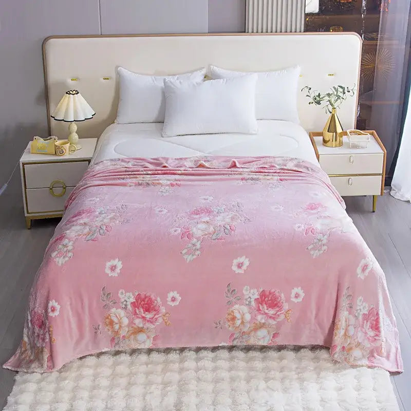 Pink floral throw blanket with soft plush texture and gentle sheen complements decorbites dinosaur patterns snowflake velvet blanket