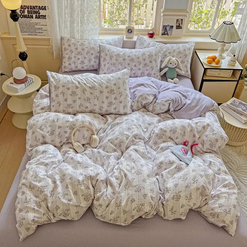 Floral-patterned white and lavender duvet cover set with soft textured fabric in a mint green floral double layer yarn design