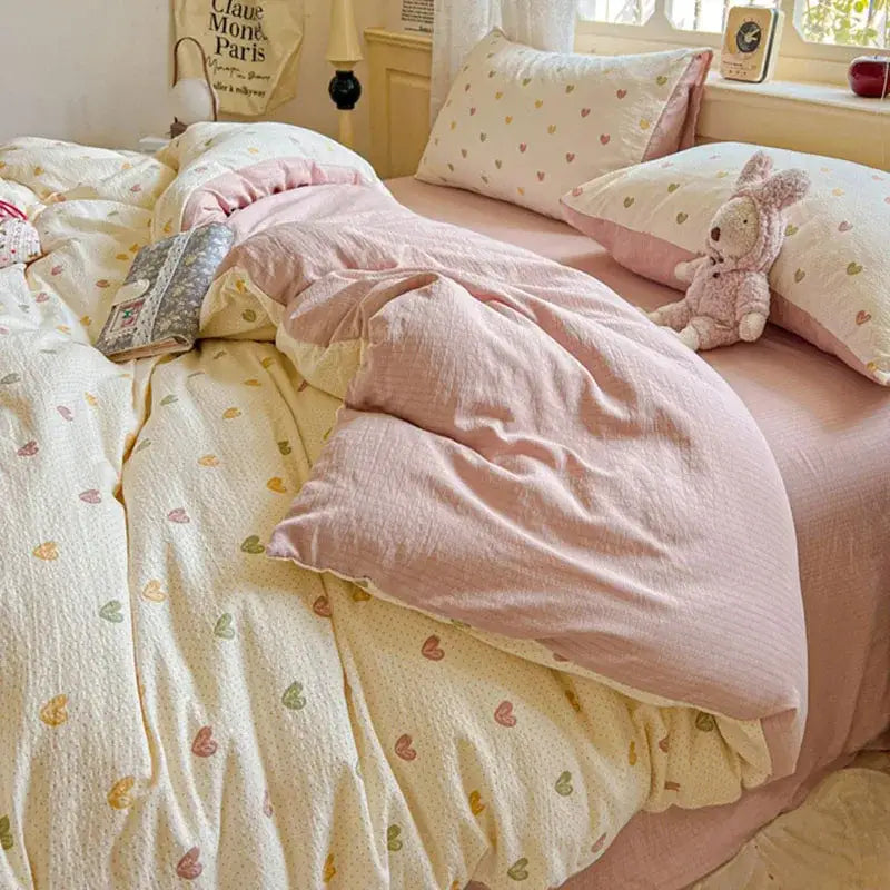 Pink and cream heart-patterned cotton duvet cover set with soft textured finish for a mint green floral bedroom cover set