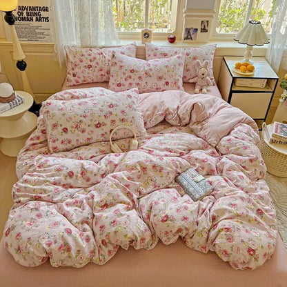 Pink floral duvet cover set with soft textured fabric and delicate rose patterns for a mint green yarn bedroom