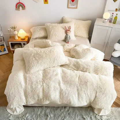 Cream-colored plush fluffy faux fur bedding set with matching pillows featured in decorbites fluffy faux bedroom decor