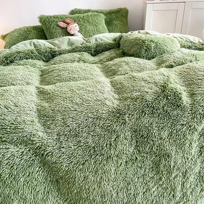 Soft moss-green fluffy faux fur bedding set with plush textured fabric and matching heart pillow for cozy decorbites fluffy faux comfort