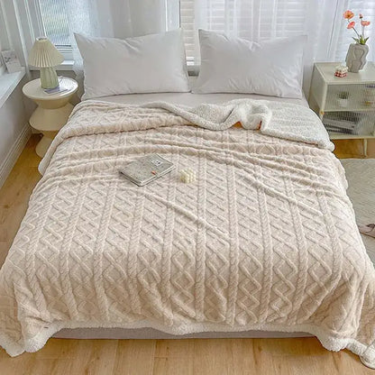 Cream-colored plush throw blanket with textured cable-knit pattern and soft fleece lining by decorbites coral fleece