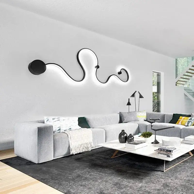 Modern abstract black iron body led wall lamp with glowing illumination for stylish bedroom decorbites iron body design