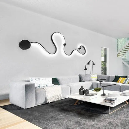 Modern abstract black iron body wall lamp with glowing led illumination for bedroom and living room decorbites iron body