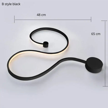 Modern abstract black iron body wall lamp with sleek s-shaped design and illuminated edges for bedroom decorbites iron body