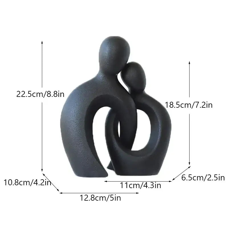 Black matte ceramic couple love sculpture with abstract stylized figures for modern living room decorbites couple love