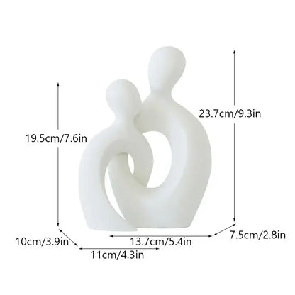 White abstract ceramic couple love sculpture featuring two intertwined forms for living room decorbites couple love decor