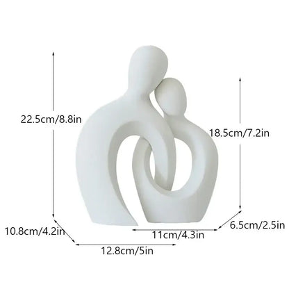 White ceramic abstract couple love sculpture featuring two intertwined figures for modern decorbites decorbites couple