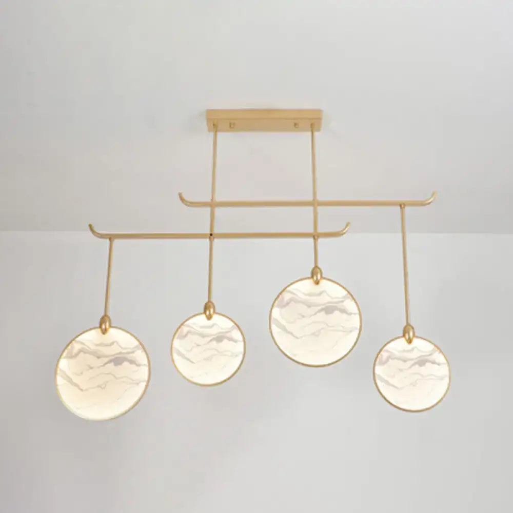 Modern acrylic led DecorBites island lamp with gold-toned frame and marble glass shades for tearoom lighting