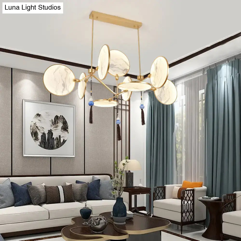 Modern acrylic led DecorBites circular island lamp with gold-toned frame and marble-like shades, ideal for tearooms