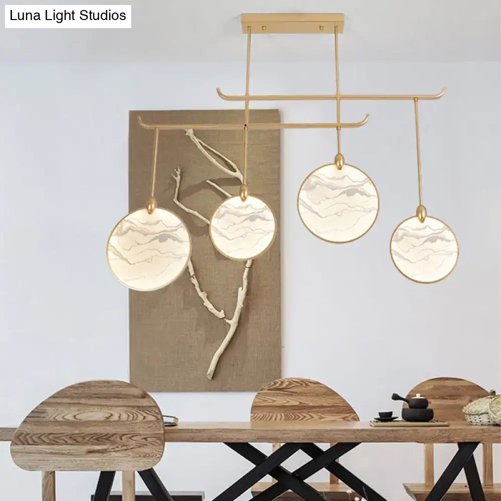 Decorbites modern acrylic led island lamp with gold-toned frame and four circular marble-patterned glass shades