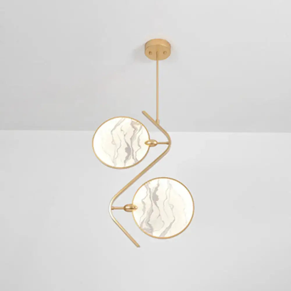 Gold-toned decorbites™ circular fan island lamp with modern acrylic led circular marble-patterned glass shades suspended