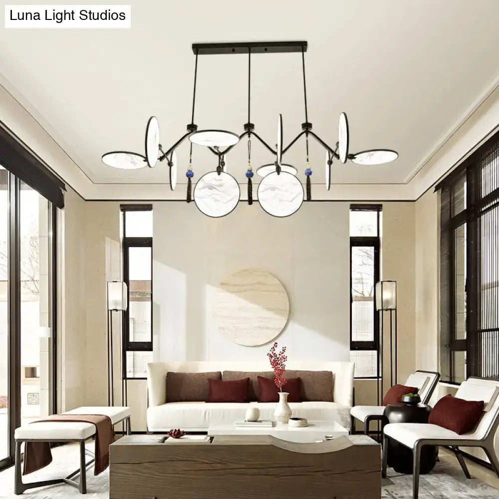 Modern black metal island lamp with white marble-effect shades and blue tassels featuring acrylic led lighting