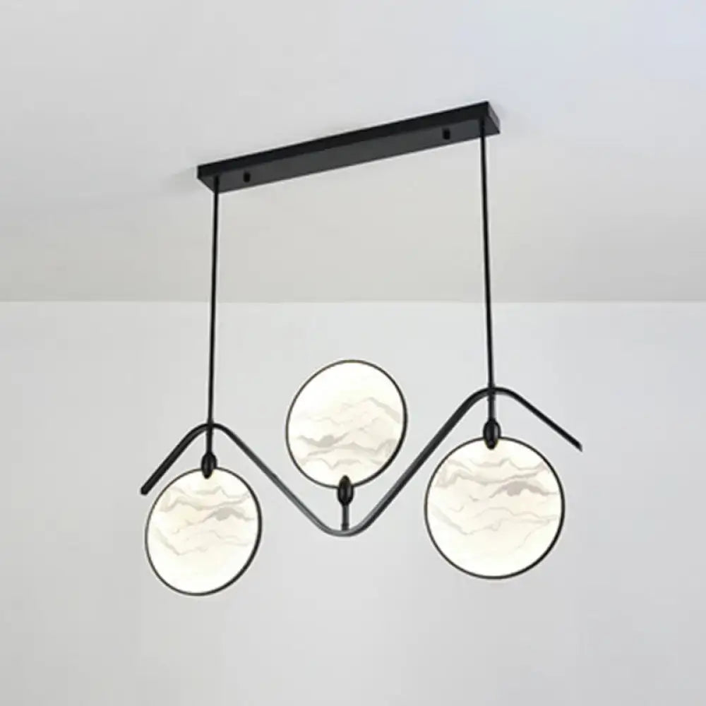 Modern acrylic led black metal island lamp with three circular marble-effect glass shades in asymmetrical design