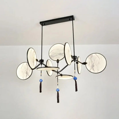 Modern acrylic led DecorBites island lamp with black metal frame, circular marble-patterned shades, and blue tassels