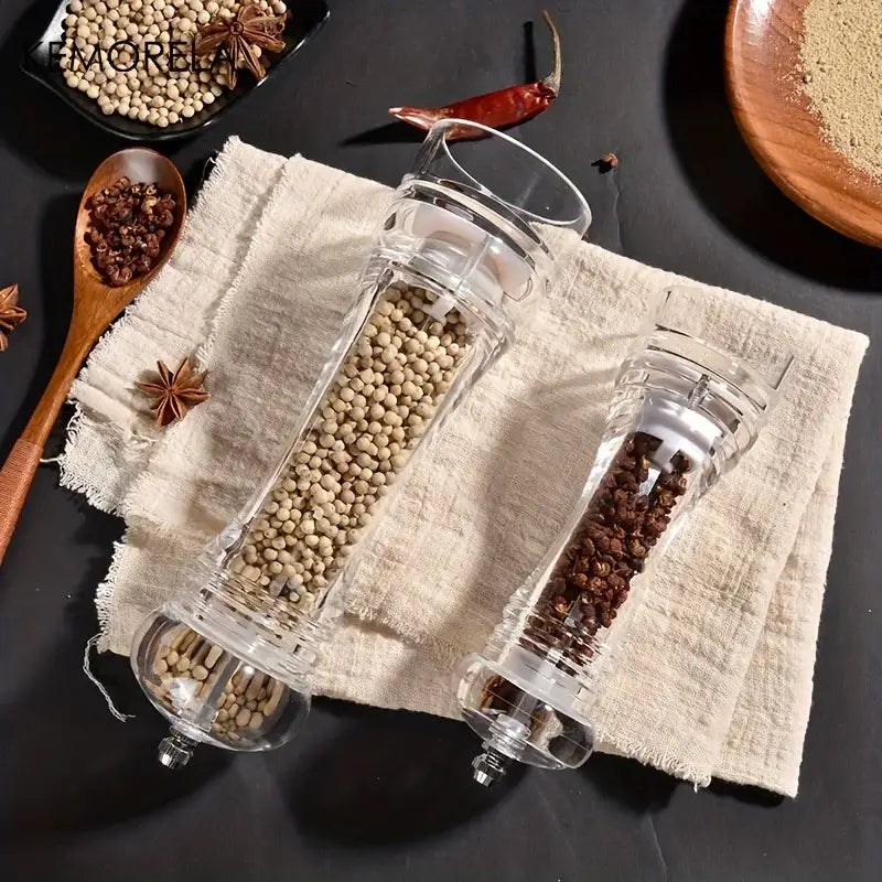 Clear glass acrylic manual pepper grinder filled with white and black peppercorns for kitchen spice mill decorbites acrylic manual