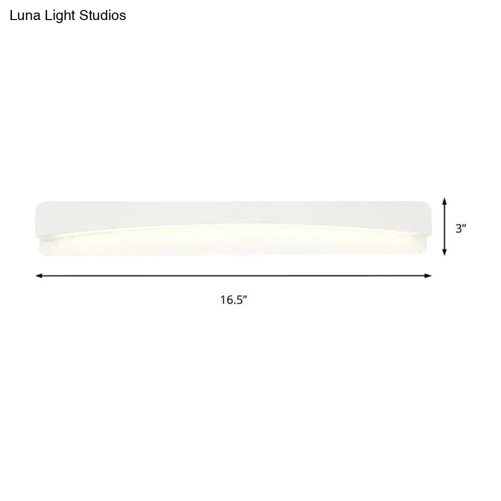Modern acrylic rectangular vanity light fixture with a sleek white diffuser and clean lines for bathroom use