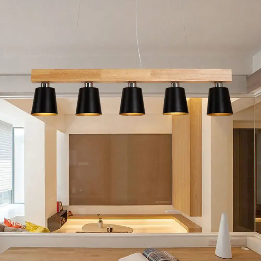 DecorBites™ modern adjustable cone pendant lamp in black with warm brass interior on light wood beam fits e26 e27 bulbs