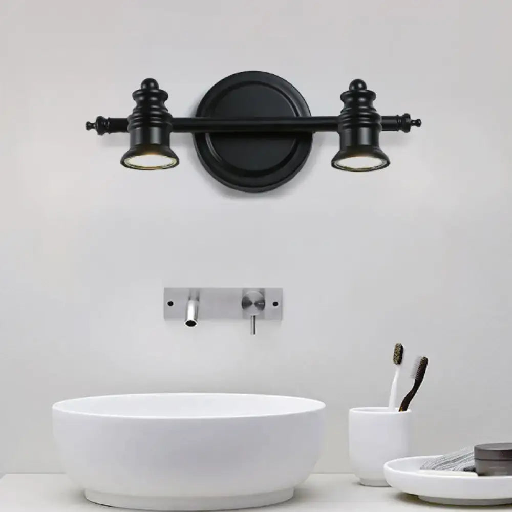 Modern adjustable matte black wall light fixture with two spotlights for bathroom vanity installation