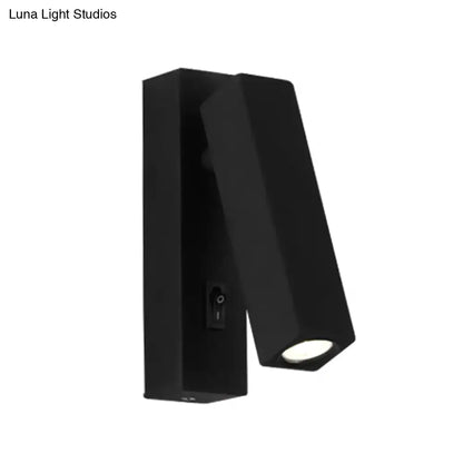 Black rectangular wall-mounted reading light with adjustable head in silver white finish for modern bedroom sconce use