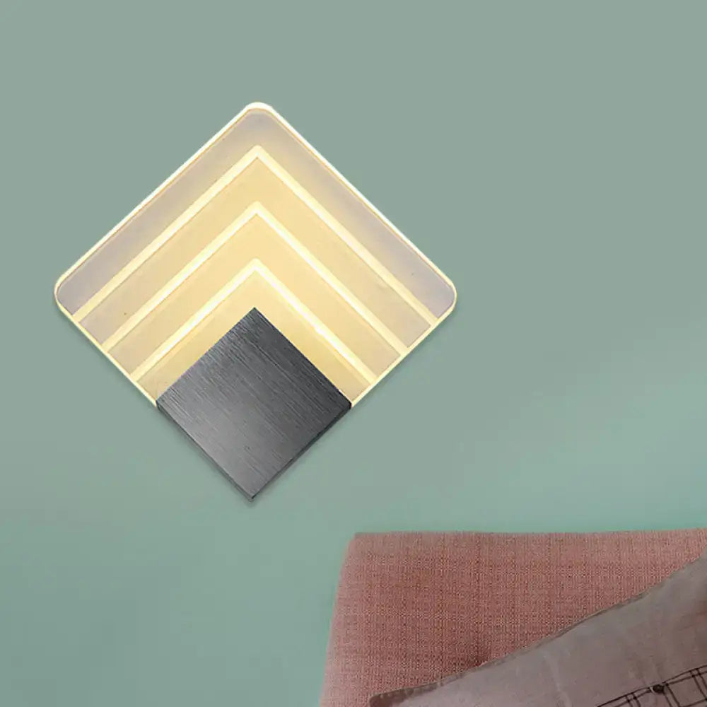 Modern aged silver and black square led wall sconce with layered translucent panels and brushed metal accent for bedroom lighting