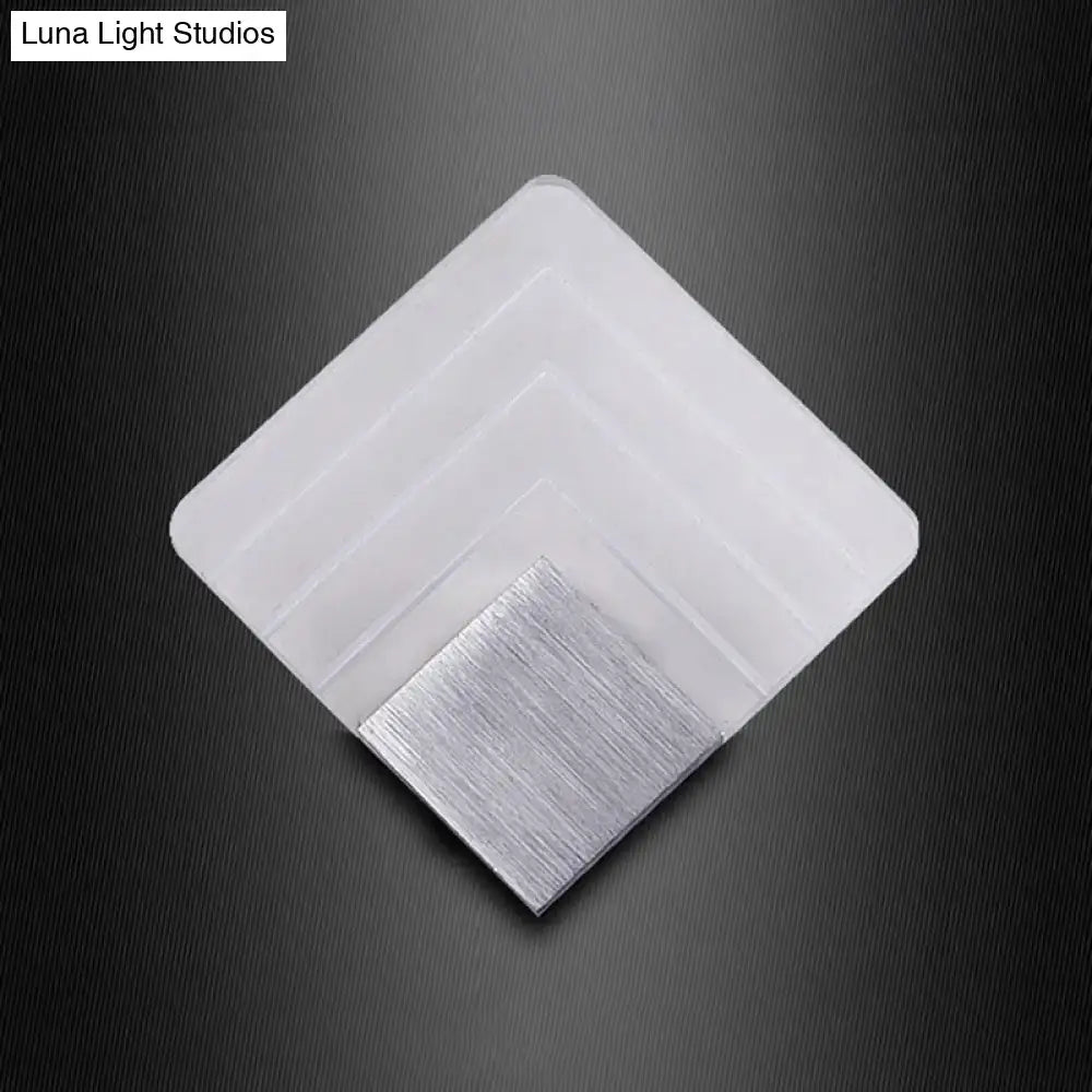 Modern aged silver and black square led wall sconce with brushed silver metallic accent for bedroom lighting