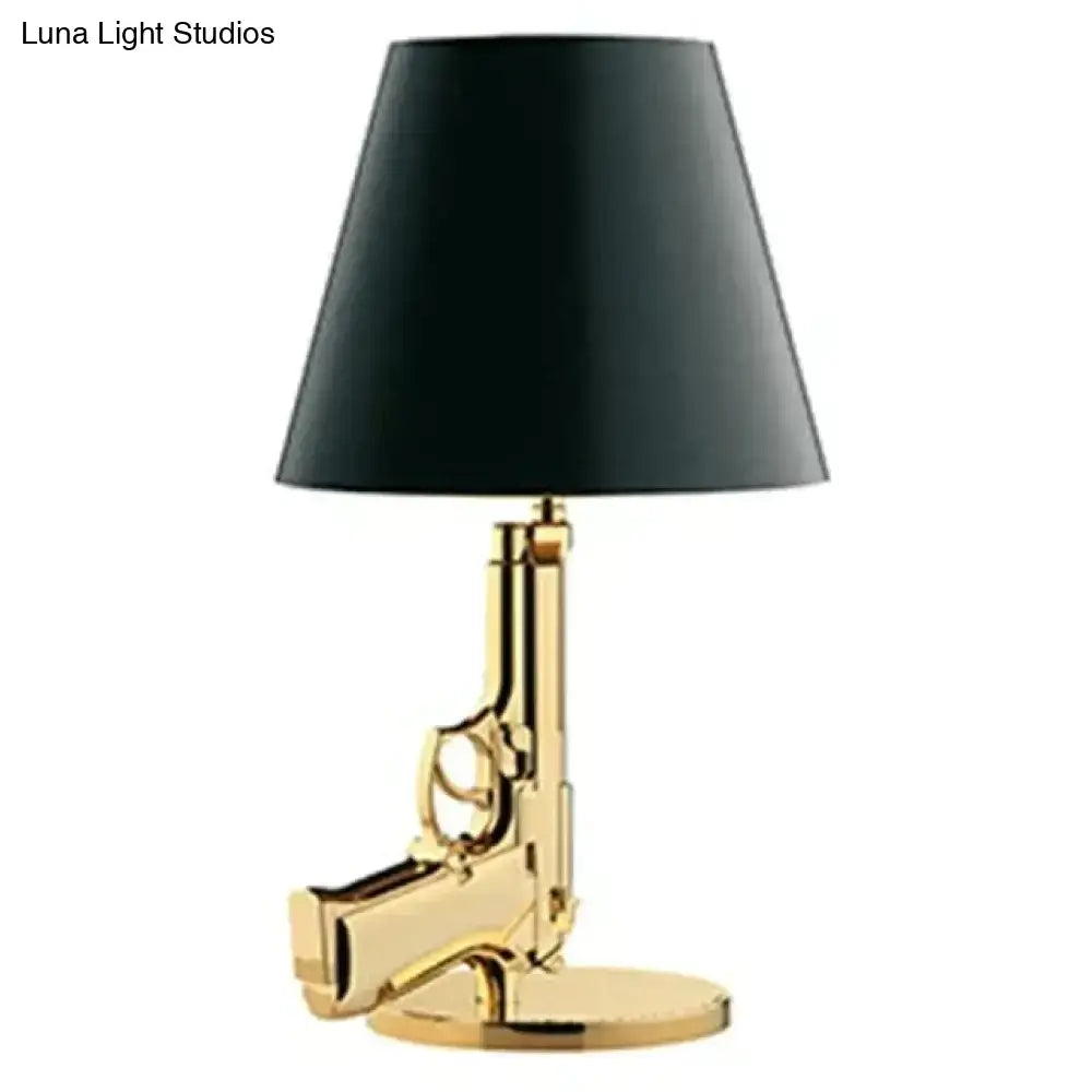 Modern ak47 gun lounge floor lamp in gold with silvery gold lustre and black conical shade for bedroom lighting
