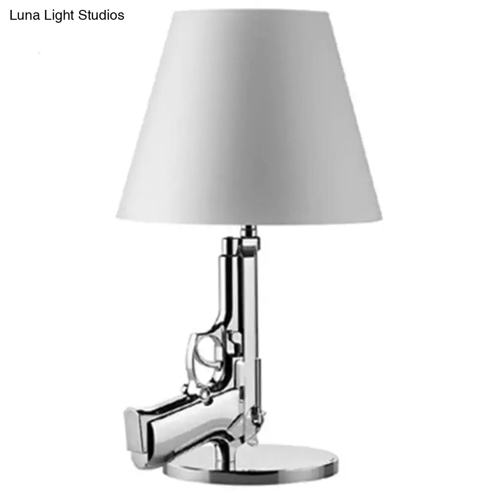 Modern ak47 gun lounge floor lamp with chrome finished pistol base and white tapered shade for bedroom lighting