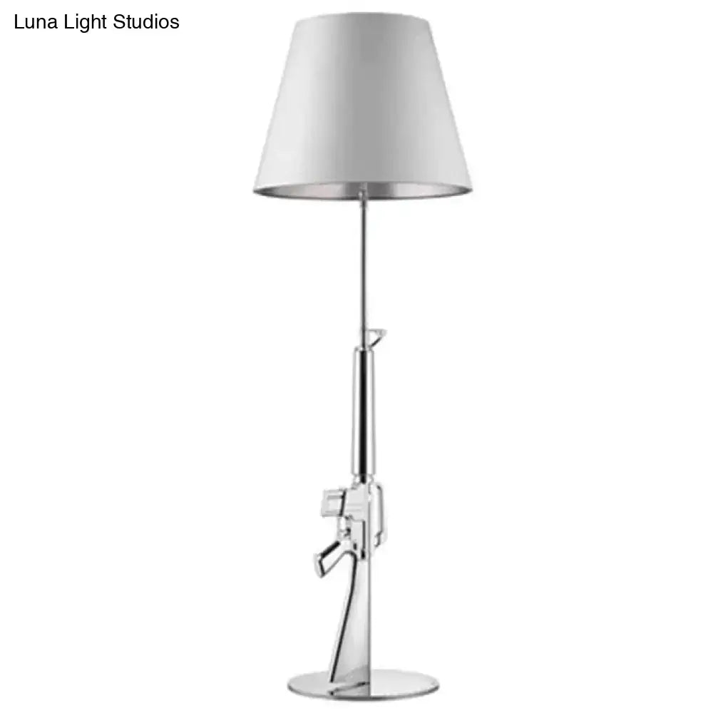 Modern ak47 gun lounge floor lamp with chrome finish, white conical shade, and silvery gold lustre for bedroom lighting